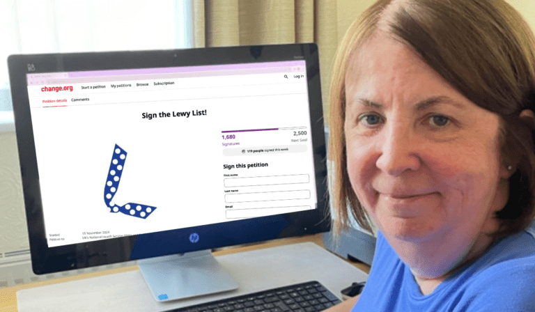 CEO of Lewy Body Society Jacqui Cannon sitting in front of a screen showing the Lewy List petition page